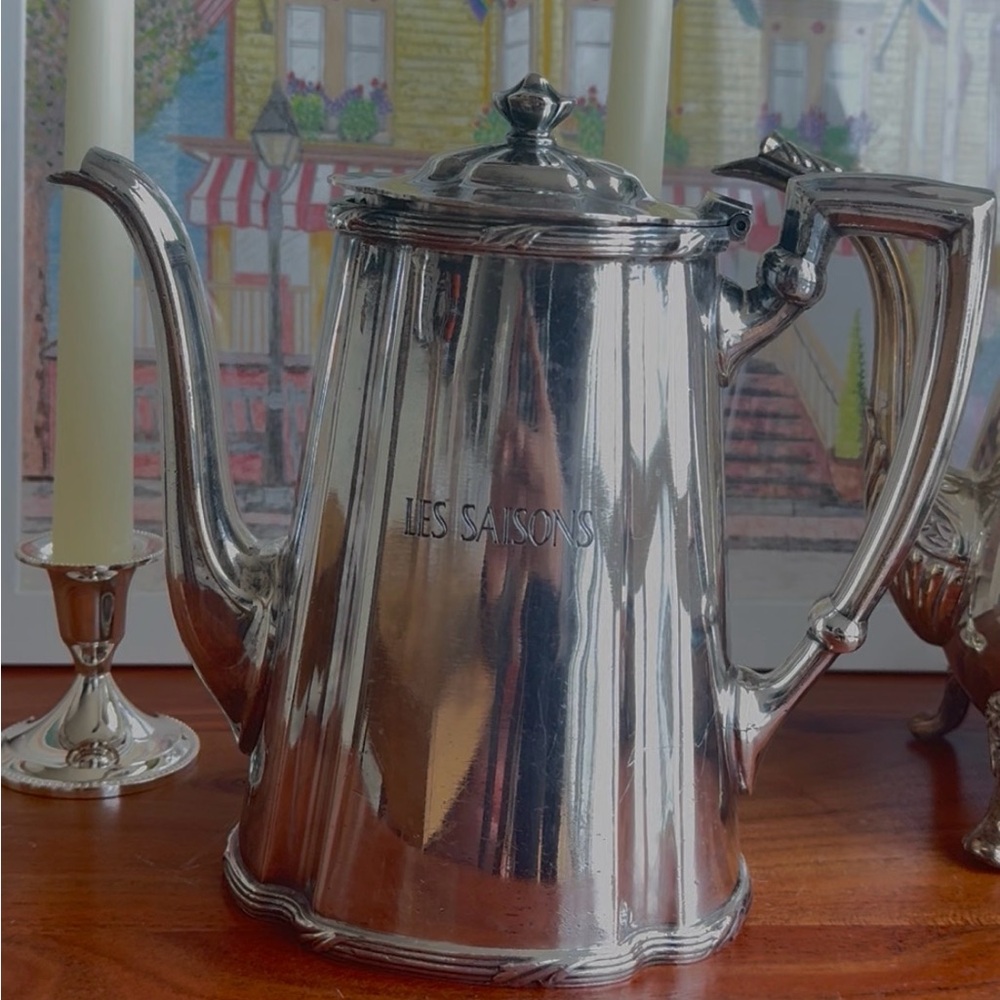 Elegant Silver Teapot by